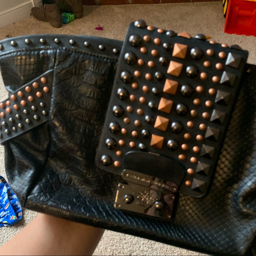 Black Christian Audigier clutch super styled